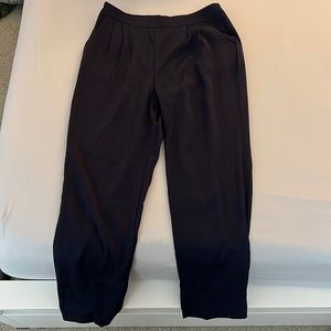 Navy blue, skinny slacks. Side zipper. Front pockets, no back pockets. Size 6